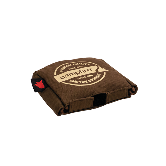 The Canvas Bag Jumbo Jaffle Single by Campfire is a brown, rectangular canvas pouch featuring a circular "Campfire" logo with "Premium Quality" text and a small red side tag. Designed with soft padding for protection, this bag provides an ideal storage solution for your Jumbo Single Jaffle Iron and is shown against a white background.