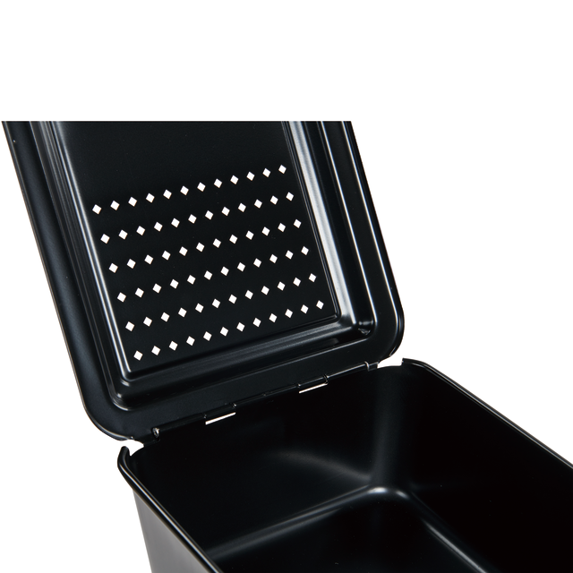 A close-up of an open Campfire Popcorn Pan by Campfire, crafted from black metal and featuring a lid with a pattern of small diamond-shaped holes—perfect for making fire-popped popcorn and enjoying classic campfire cooking.