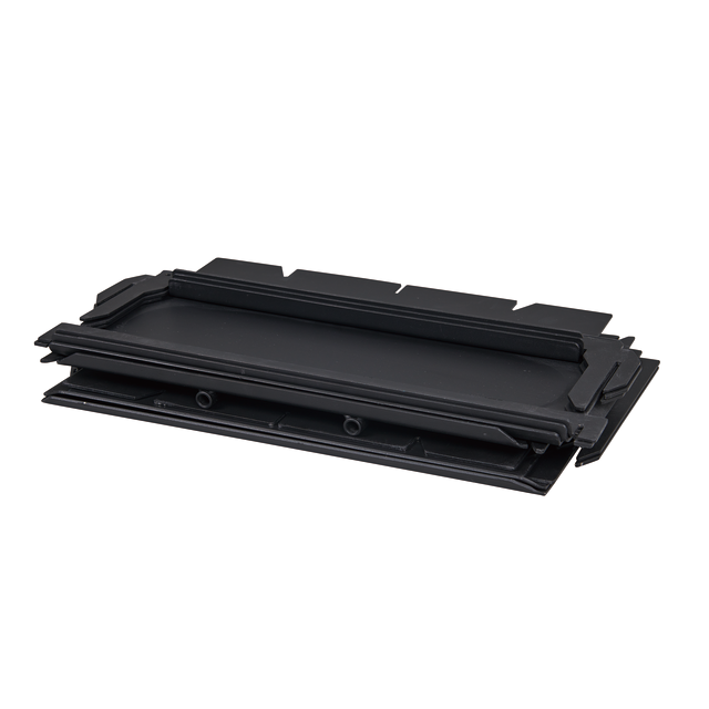 A stack of black plastic roof tiles with interlocking edges, arranged on a white background, echoes the organized efficiency of packing essentials like the Ozpig 3-in-1 Flat Pack Fire Pit for outdoor adventures.