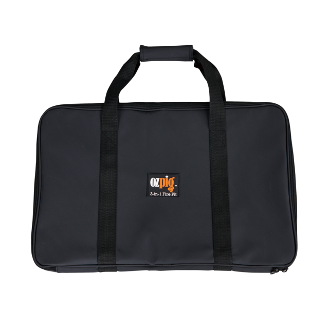 A black rectangular carrying case with handles and a padded grip, featuring the "Ozpig 3-in-1 Flat Pack Fire Pit" logo on the front—perfect for transporting your Ozpig portable fire pit to any campsite or outdoor adventure.