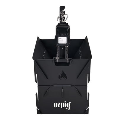 Black metal Ozpig Fire Pit Rotisserie Kit with a digital temperature control unit mounted on top, viewed from above. The Ozpig logo and a flame icon are visible on the front of the unit, making it ideal for outdoor cooking enthusiasts seeking that signature wood-fired flavour.