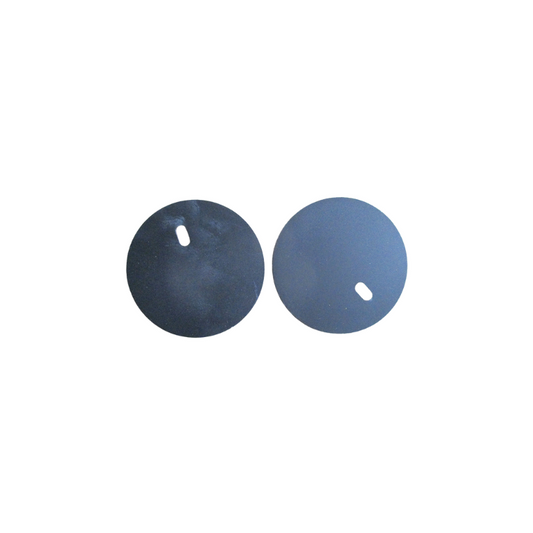 Two black circular discs with small oval holes near their edges are shown side by side on a white background—these are the Ozpig Big Pig Cooking Port Plates by Ozpig, designed as replacement cooking port plates for the Big Pig.