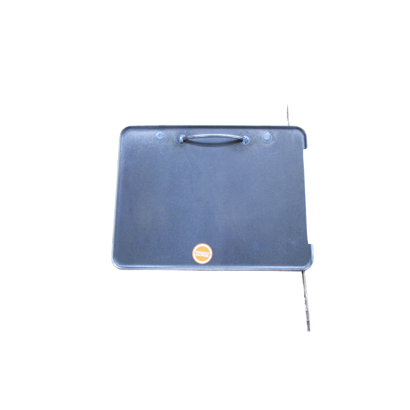 A black, rectangular Ozpig Traveller BBQ Plate with a handle and a small orange circular label is displayed on a white background. A thin metal rod extends from the right side. Designed as a replacement accessory by Ozpig, this plate (model OZP-T-001-01) is ideal for maintaining your outdoor cooking setup in excellent condition.