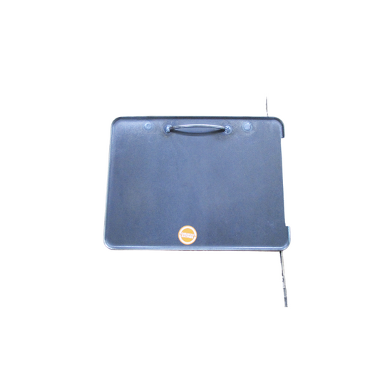 A black, rectangular Ozpig Traveller BBQ Plate with a handle and a small orange circular label is displayed on a white background. A thin metal rod extends from the right side. Designed as a replacement accessory by Ozpig, this plate (model OZP-T-001-01) is ideal for maintaining your outdoor cooking setup in excellent condition.