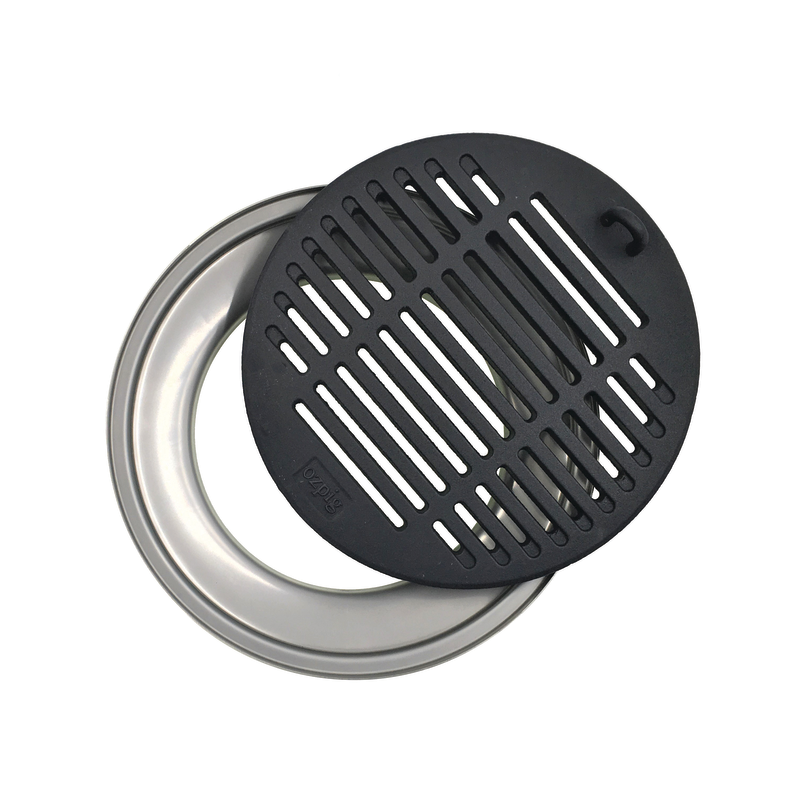 The Ozpig Chargrill Plate and Drip Tray by Ozpig features a round metal tray and a black, slotted cast iron grill grate, both set against a white background—ideal for adding authentic wood fired flavour to your Ozpig cooking experience.