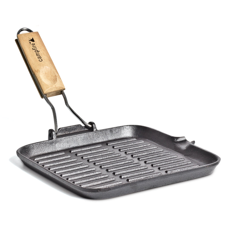 The Campfire 24cm Square Grill Frypan features a pre-seasoned, ridged cast iron surface for stovetop grilling, a handy pour spout, and a sturdy folding handle for convenience.