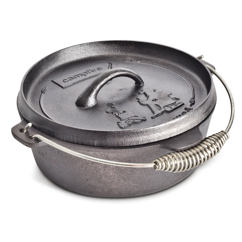The Campfire 2 Quart Camp Oven – Pre-Seasoned is a black cast iron pot designed for outdoor cooking, featuring a lid with an embossed Campfire logo, sturdy short side handles, and a robust handle with a metal coil grip—making it the perfect reliable camp oven.
