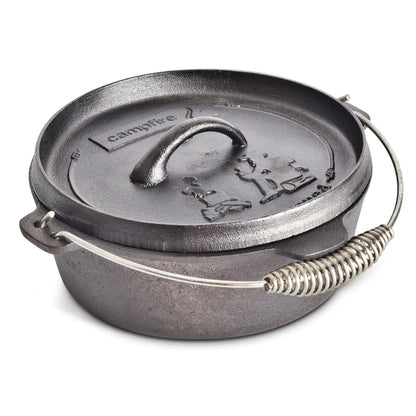 The Campfire 2 Quart Camp Oven – Pre-Seasoned is a black cast iron pot designed for outdoor cooking, featuring a lid with an embossed Campfire logo, sturdy short side handles, and a robust handle with a metal coil grip—making it the perfect reliable camp oven.