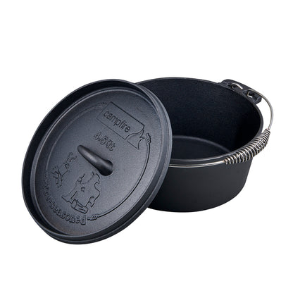 The Campfire 4.5 Quart Camp Oven, in black pre-seasoned cast iron, features a sturdy metal handle and is displayed on a white background. Its lid—embossed with a campfire design and the brand name—leans against the pot, making it ideal for outdoor cooking.