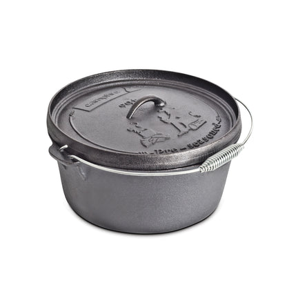 The Campfire 9 Quart Camp Oven is a round, black cast iron Dutch oven with a metal handle and a fitted lid embossed with decorative designs and text—ideal for outdoor cooking over a campfire.