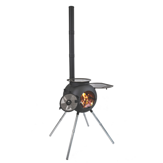 The Ozpig Series 2 Portable Wood Fire Stove by Ozpig features four legs, a tall chimney, and a round fire chamber with an open side door displaying burning logs—ideal for outdoor cooking.