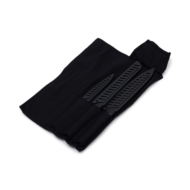 The Campfire 3pc Premium Knife Set features black stainless steel knives with textured blades, partially inserted into a black fabric pouch displayed on a white surface.