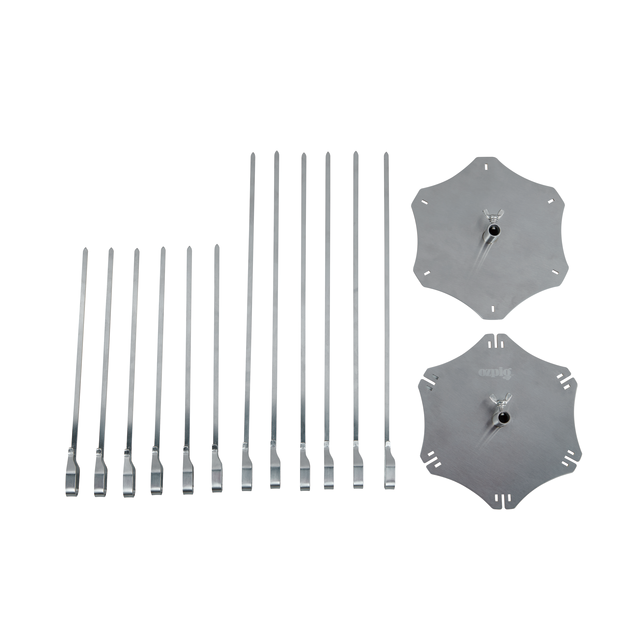 The Ozpig Kebab Rotisserie Set by Ozpig includes 12 stainless steel skewers in assorted lengths and 2 flat, round plates with central holes and notched edges—ideal for making kebabs.