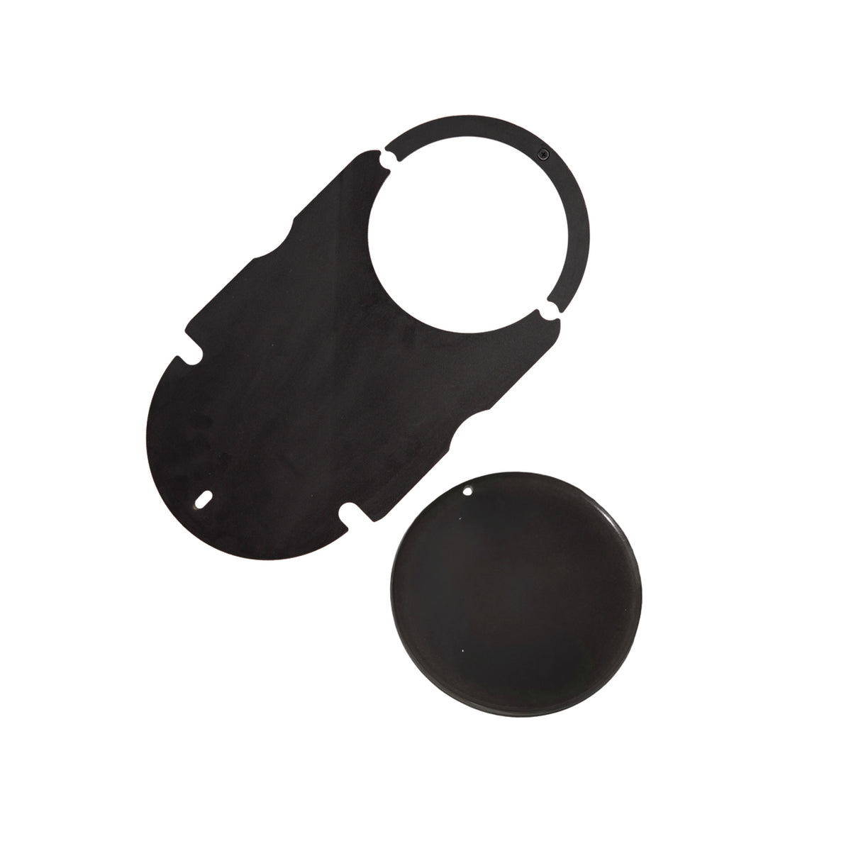 A black, flat, oval-shaped plastic piece with notches and a circular opening—part of the Ozpig Big Pig Oven Smoker Adapter by Ozpig—next to a separate black disc, both on a white background.