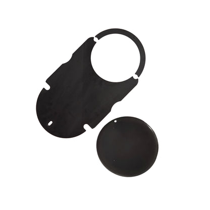 A black, flat, oval-shaped plastic piece with notches and a circular opening—part of the Ozpig Big Pig Oven Smoker Adapter by Ozpig—next to a separate black disc, both on a white background.