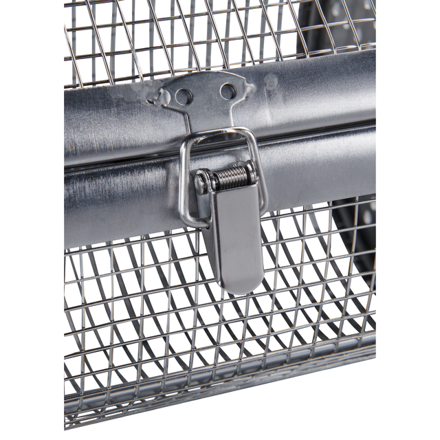 Close-up of a metal mesh latch mechanism secured to a wire cage or basket, highlighting the clasp and spring detail—an essential feature of the Ozpig Rotisserie Basket Large by Ozpig, a versatile accessory specifically designed for wood-fired cooking.